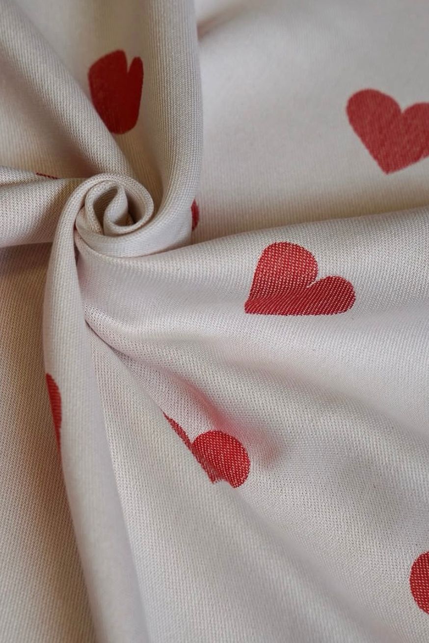 Portabebé Flip Corazones de amor