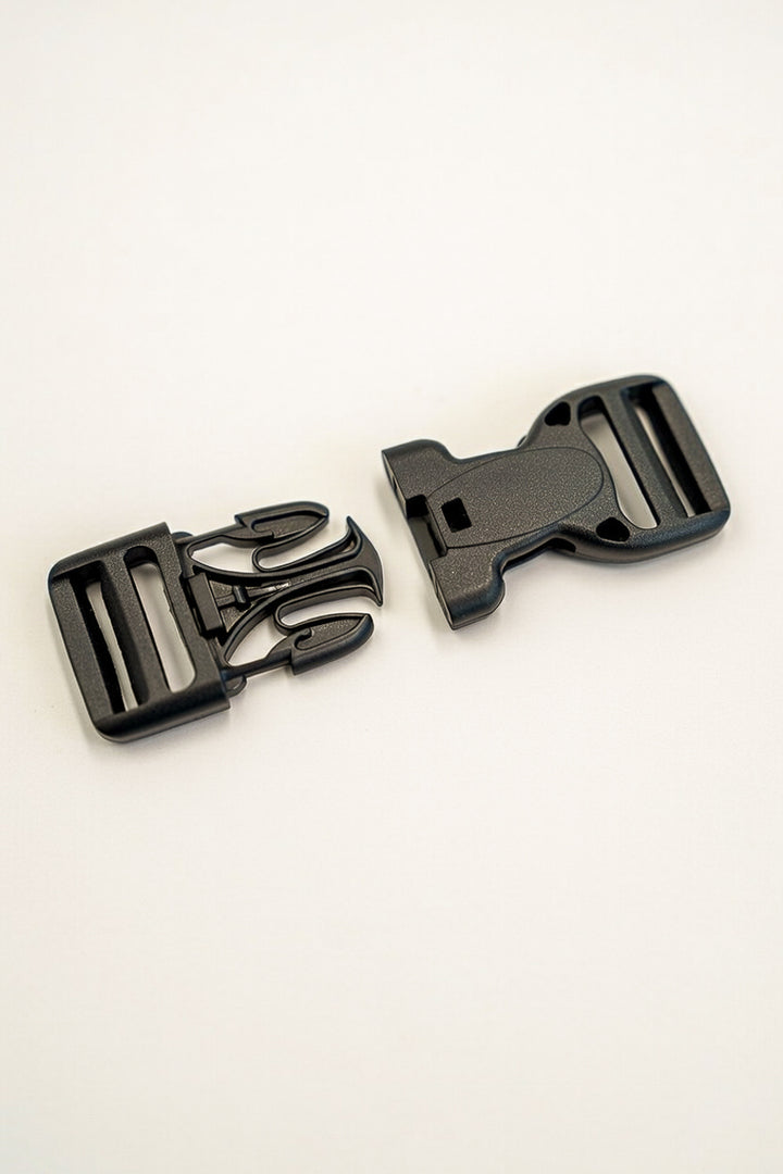 Hebilla con botón de seguridad 25mm negro