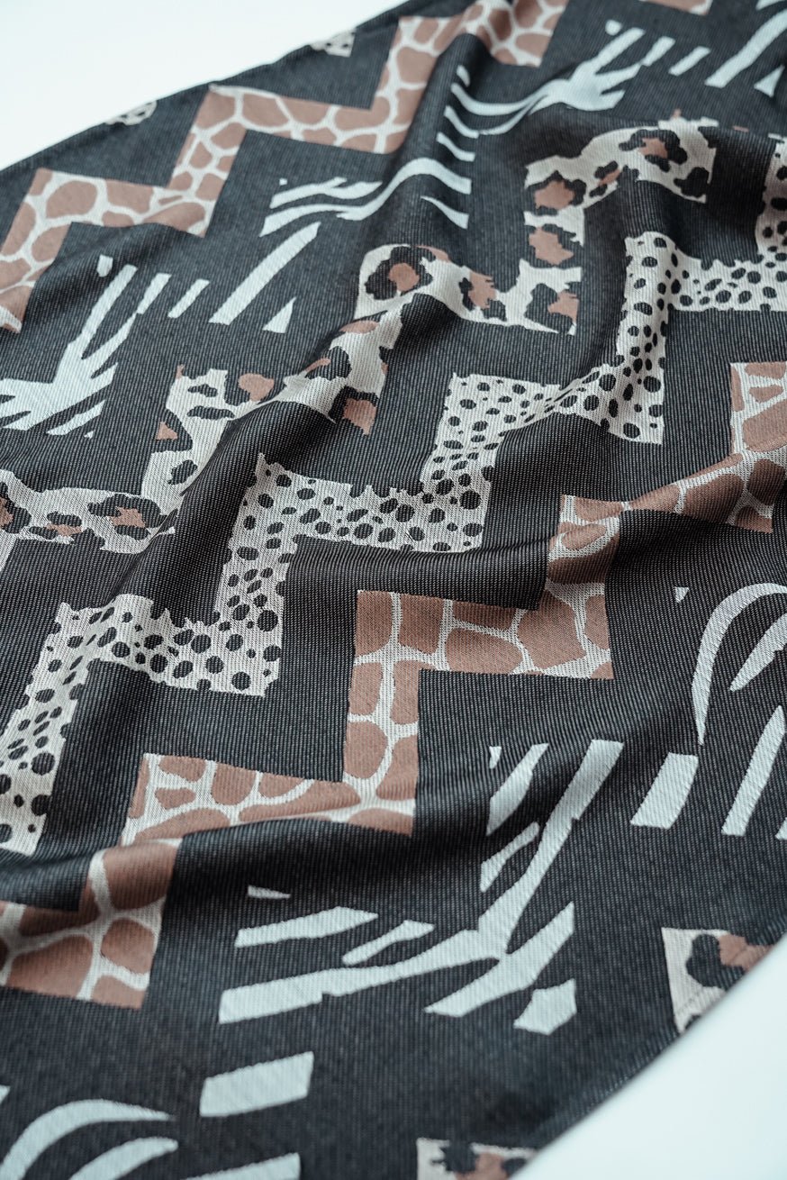 Portabebé Flip Ariane animal salvaje KOKADI