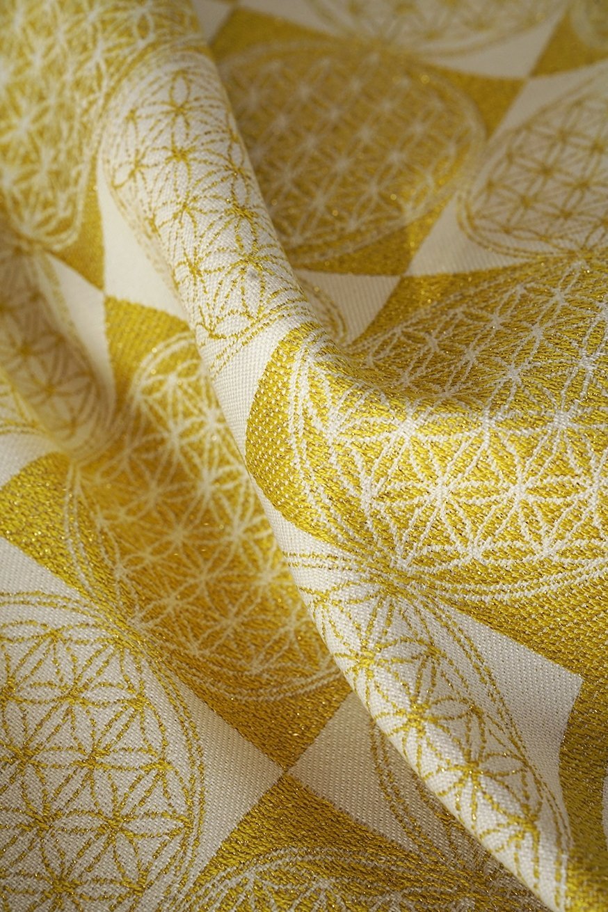 KOKADI Babytrage Onbu Blume des Lebens gold