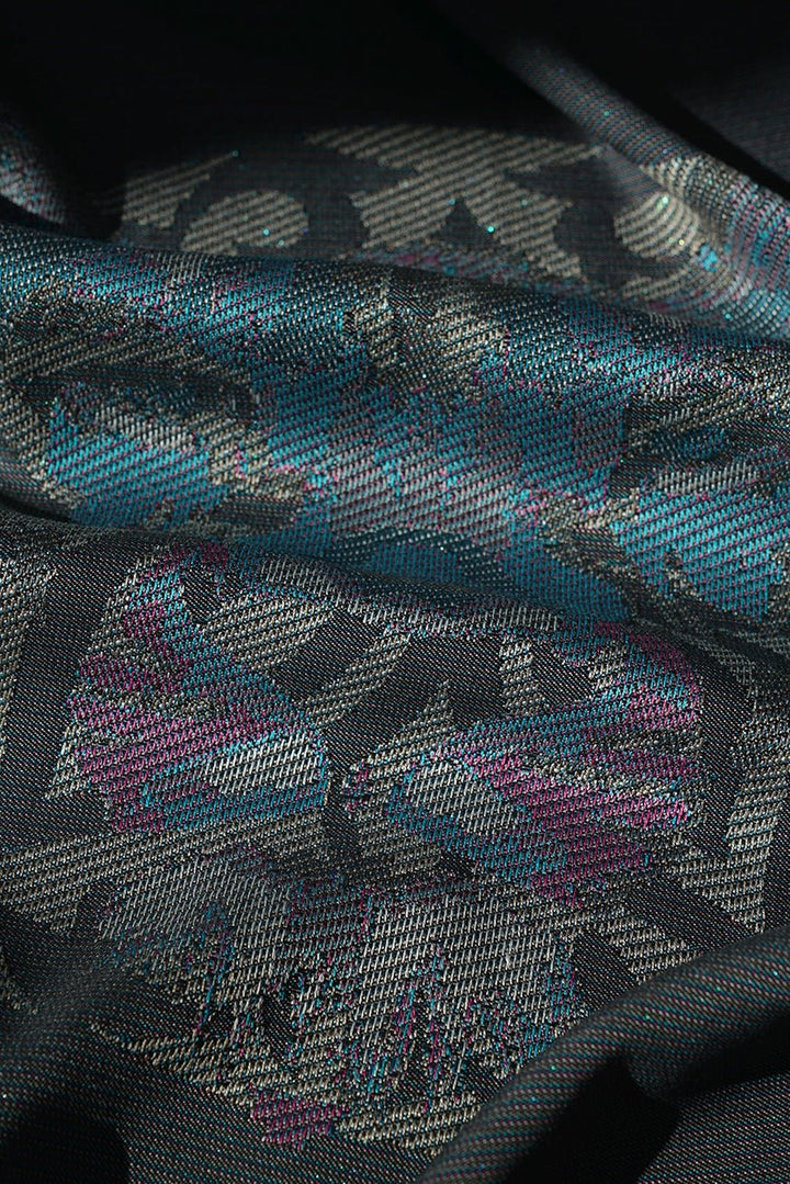 KOKADI Portabebé Onbu Carlota niña león 