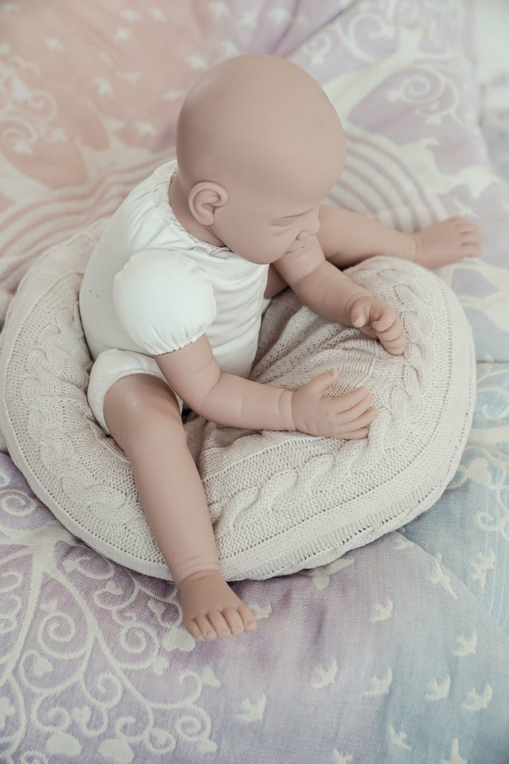 KOKADI llevando muñeca - KOKADI