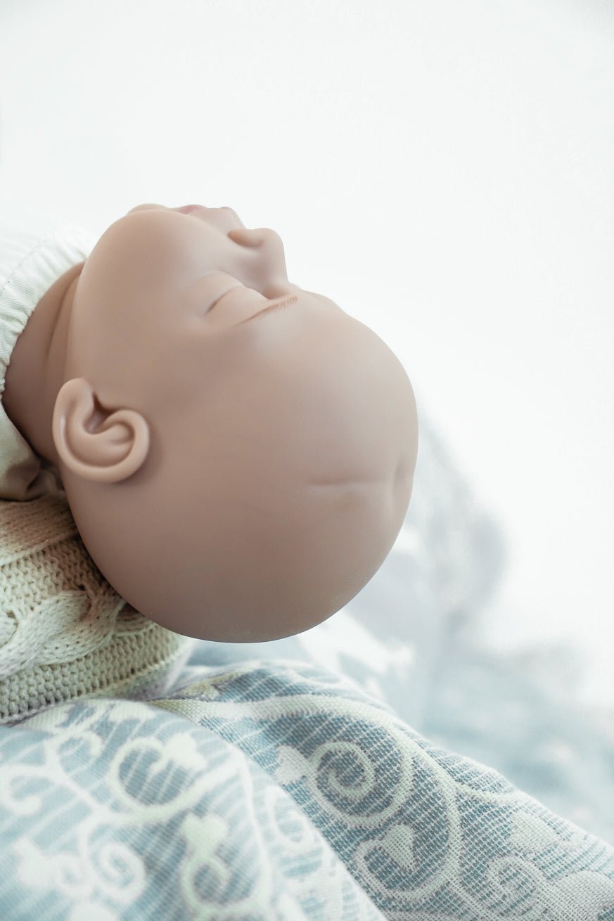 KOKADI llevando muñeca - KOKADI