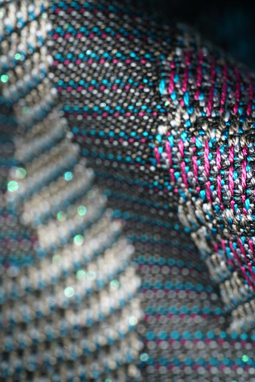 KOKADI Fular portabebé Carlota niña león